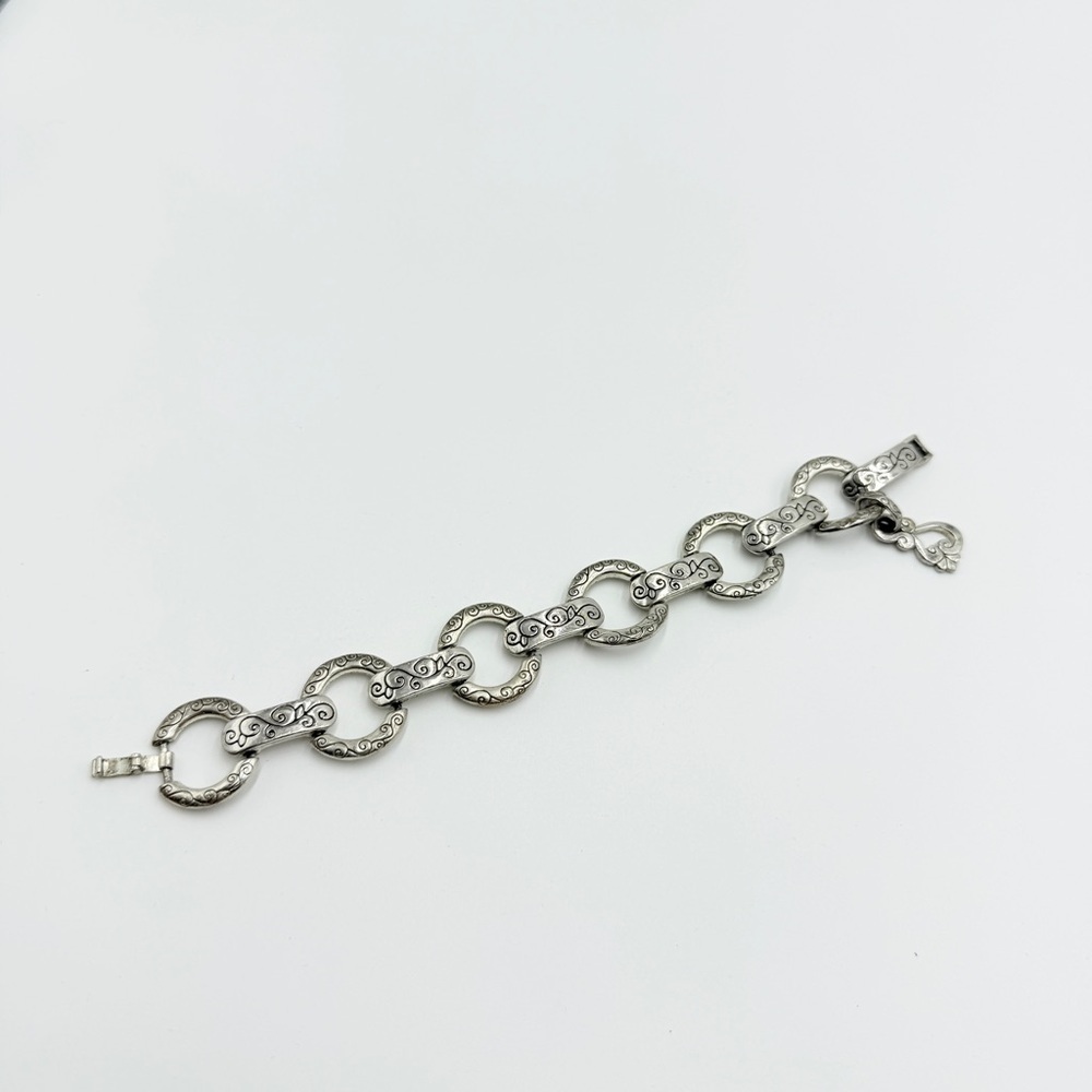 Vintage Silver Tone Link Bracelet with Engraved Scroll Pattern and Clasp